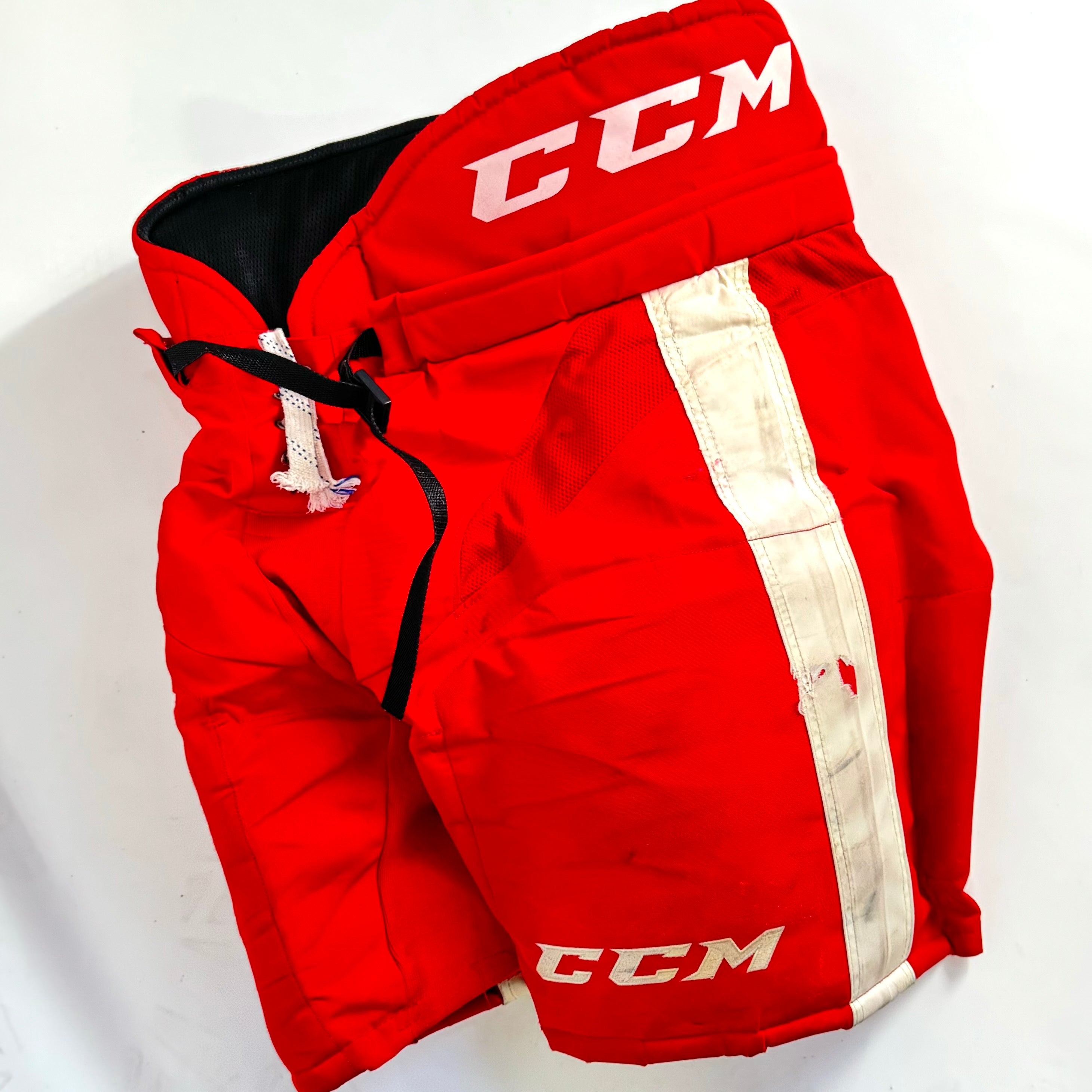 CCM HP30 - Pantalon de hockey Pro Stock d'occasion de la Ligue de hockey de l'Ontario (rouge/blanc)